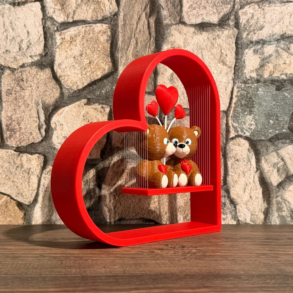 Teddybären Paar mit Herzschaukel