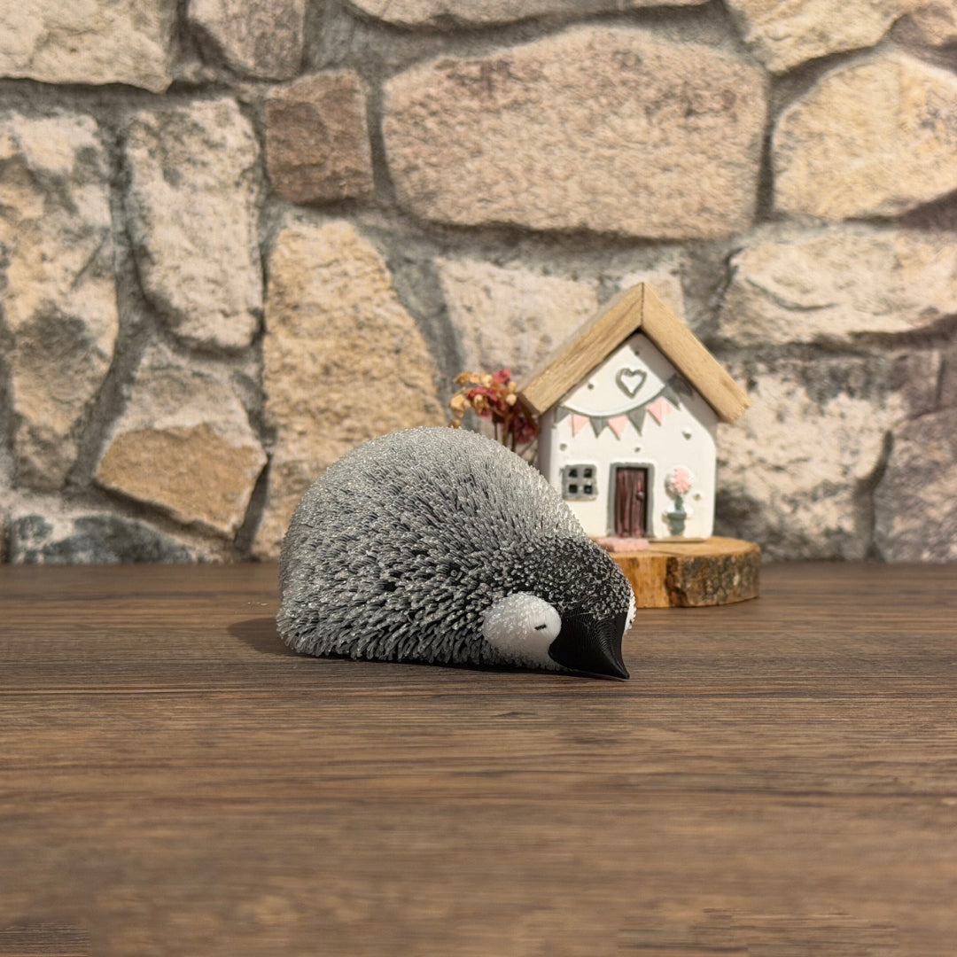 Flauschiger Pinguin Liegend