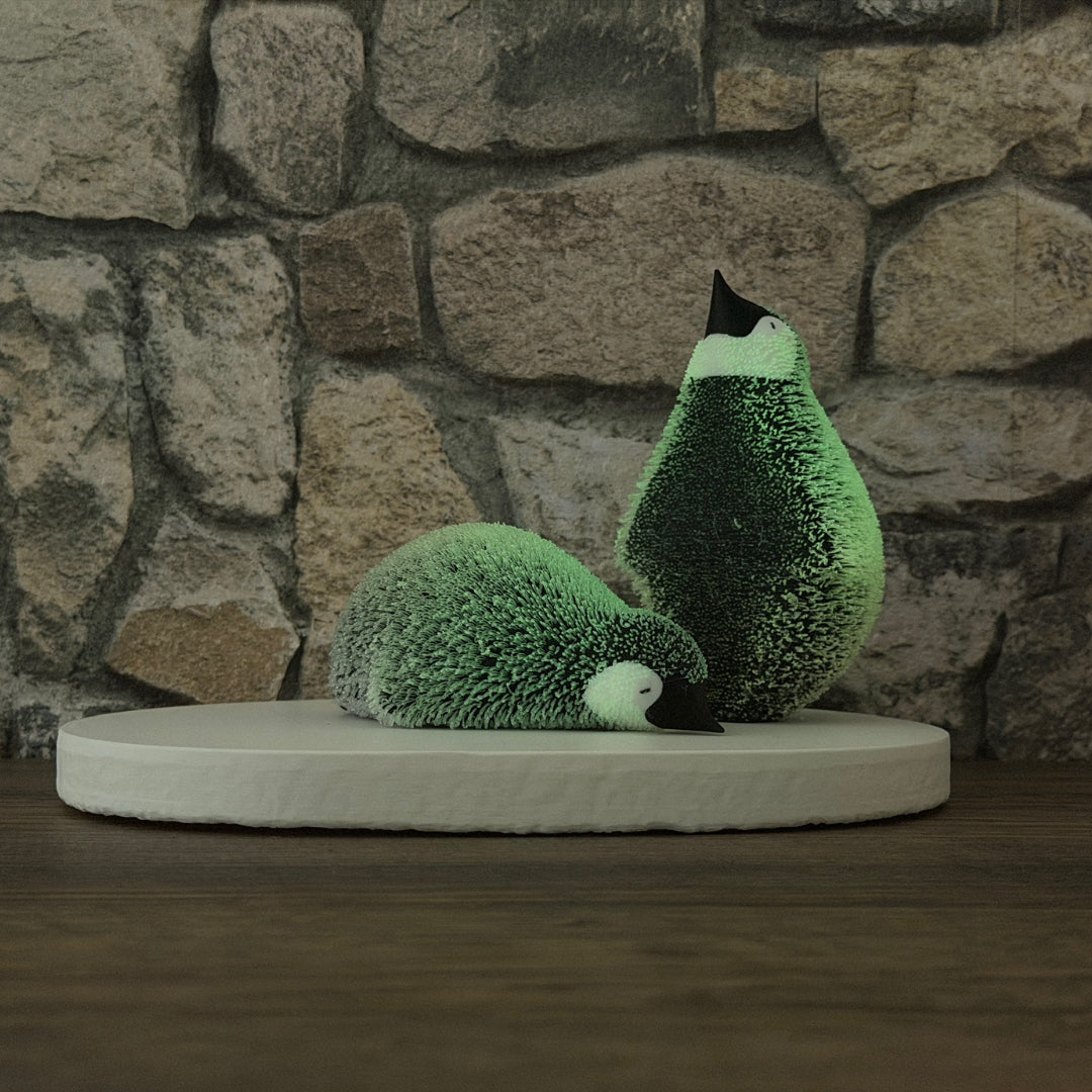 Flauschiger Pinguin Liegend