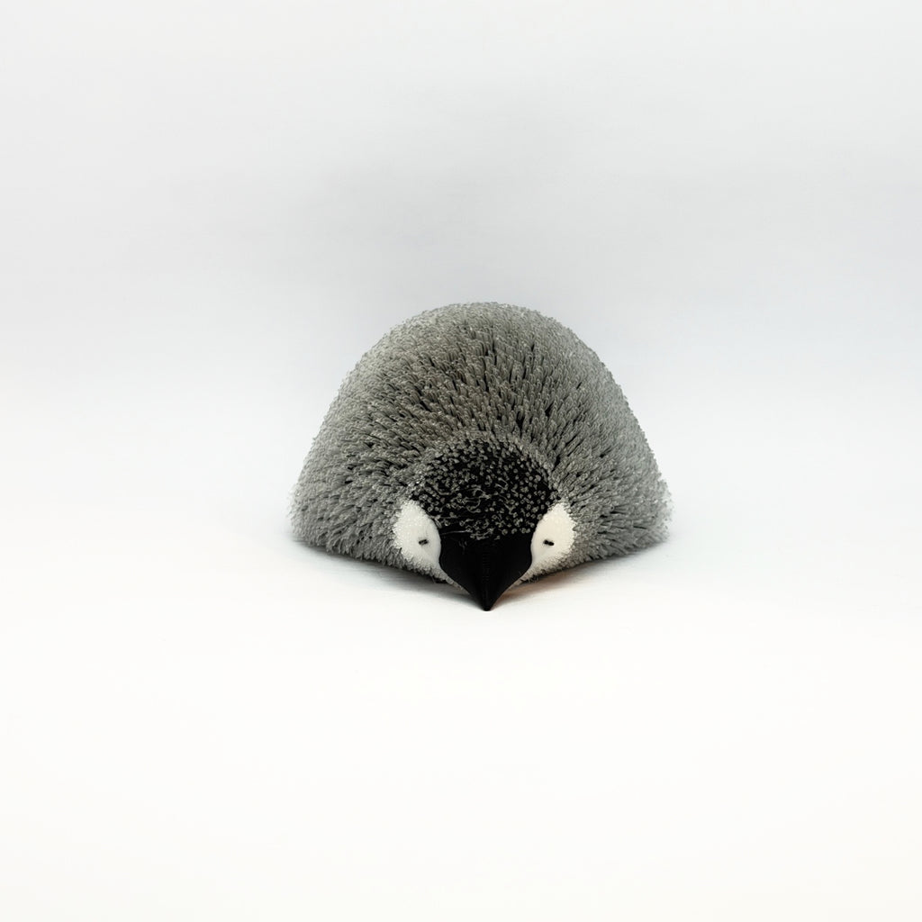 Flauschiger Pinguin Liegend