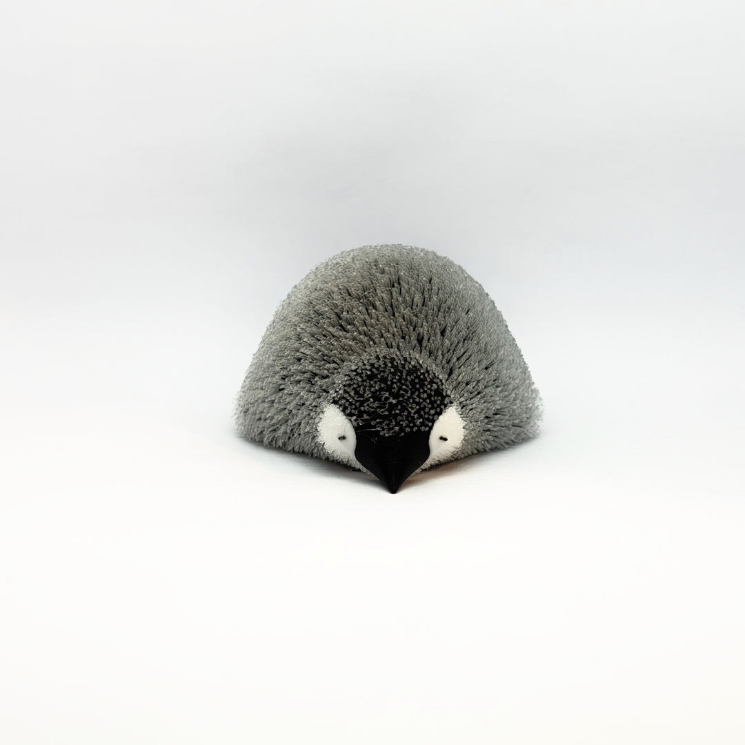 Flauschiger Pinguin Liegend