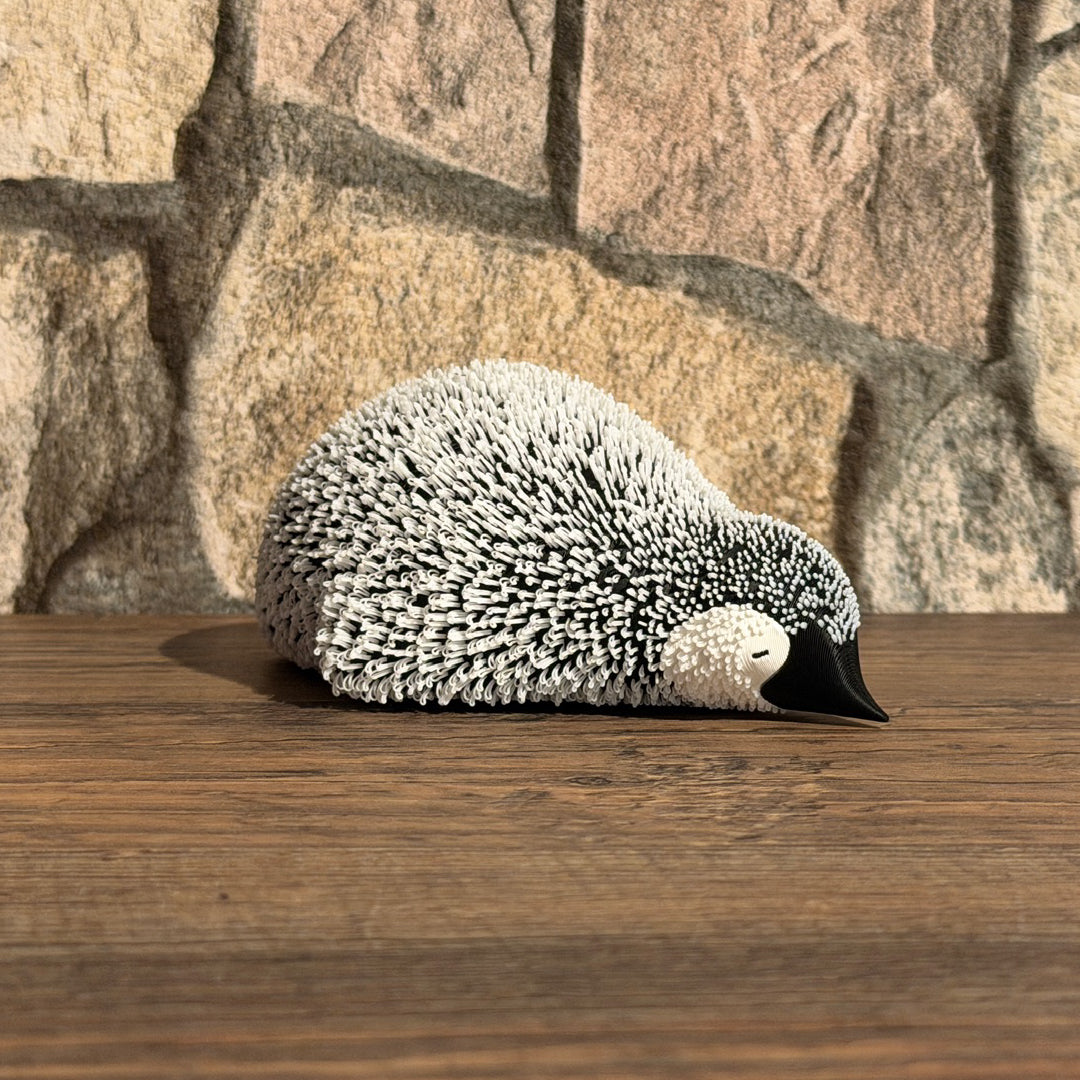 Flauschiger Pinguin Liegend